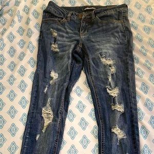 Dollhouse size 5 ripped jeans never been worn